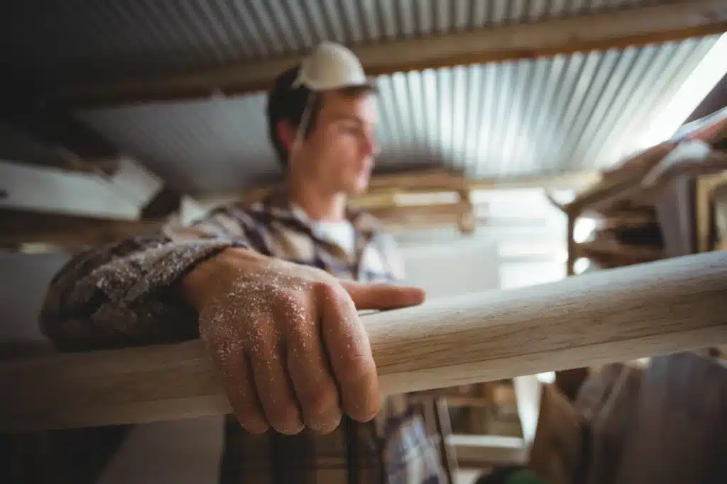 Hiring Amish Deck Builders in Pittsburgh? Everything You Need to Know 2 man making surfboard